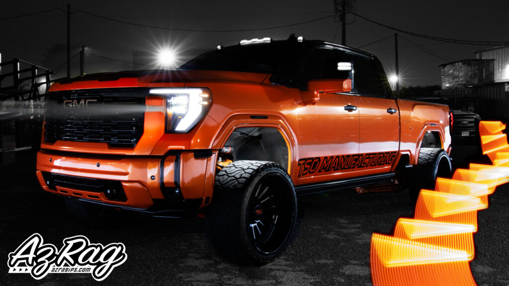 GMC Sierra Duramax Color Change Wrap in Knoxville: Hexis Zenith Orange with Custom Graphics