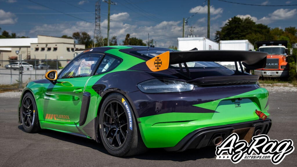 Porsche GT4 Clubsport Race Livery: Green, Black, and Built for the Track
