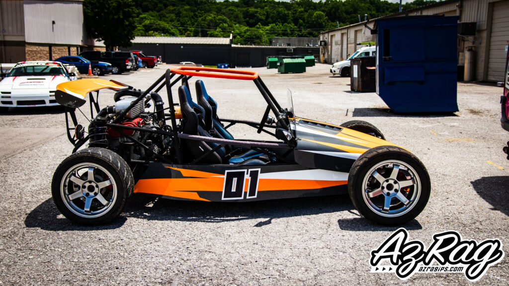 Goblin open wheel race car livery wrap orange black number 01 side profile AZ Rag Knoxville