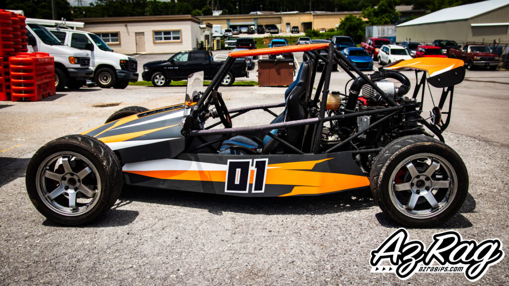 Goblin open wheel race car livery wrap orange black white full side view AZ Rag Knoxville