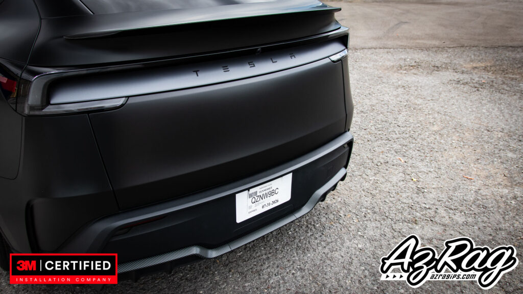 satin black Tesla Model Y Performance wrap with carbon accents Knoxville TN