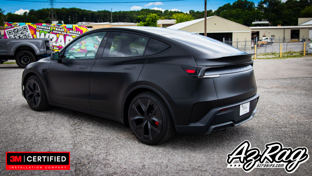 satin black Tesla Model Y Performance wrap with carbon accents Knoxville TN