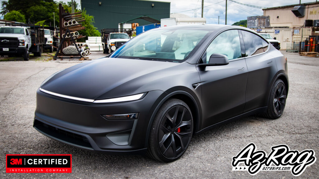 satin black Tesla Model Y Performance wrap with carbon accents Knoxville TN
