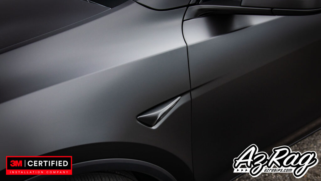 satin black Tesla Model Y Performance wrap with carbon accents Knoxville TN