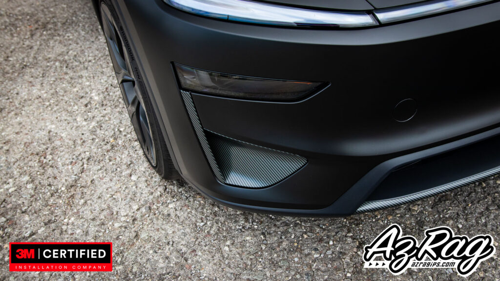 satin black Tesla Model Y Performance wrap with carbon accents Knoxville TN
