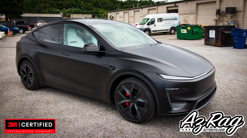 satin black Tesla Model Y Performance wrap with carbon accents Knoxville TN