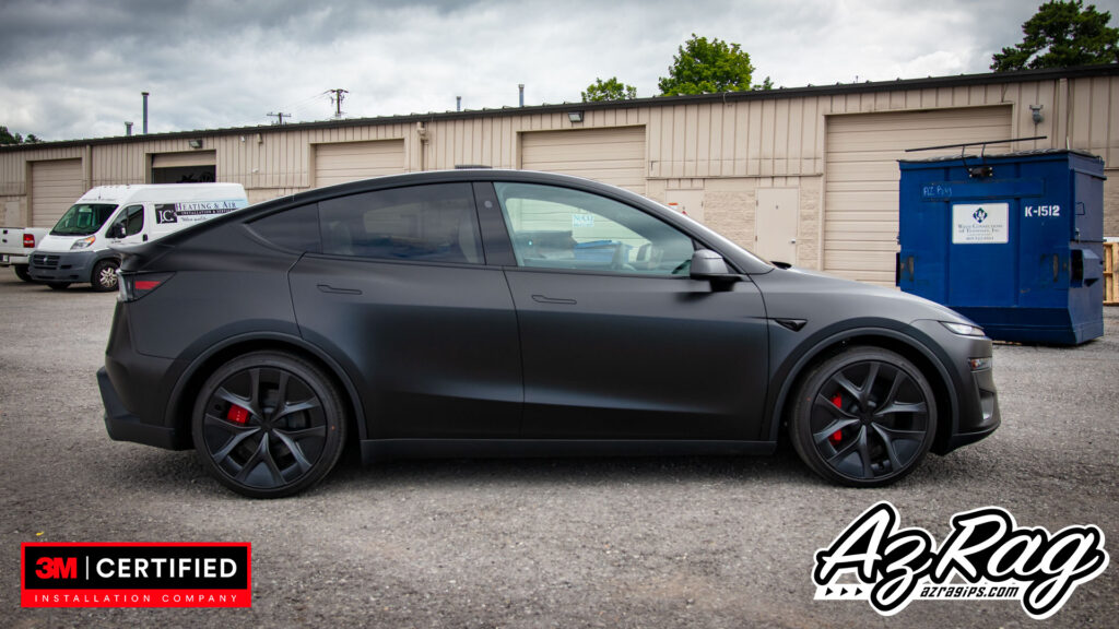 satin black Tesla Model Y Performance wrap with carbon accents Knoxville TN