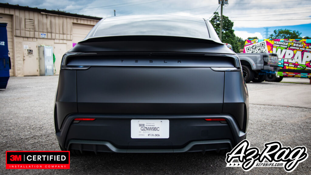 satin black Tesla Model Y Performance wrap with carbon accents Knoxville TN