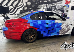 BMW M3 race car livery red blue white digital block print Knoxville TN